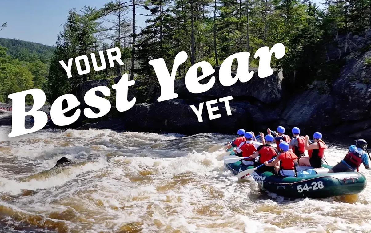 A photo of whitewater rafters with the text "Your Best Year Yet"