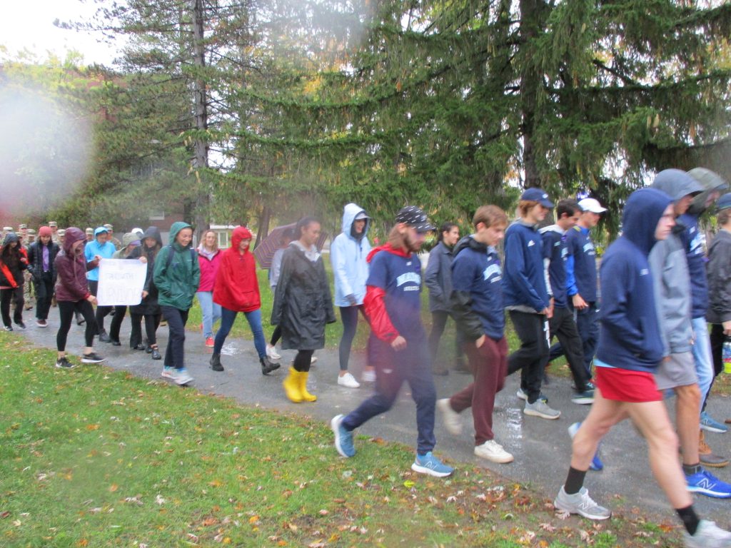 Students marching at the annual March Against Domestic Violence (2022)