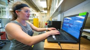 Engineering student working on a computer