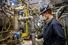 Student working with Biomass Processing & Biorefining