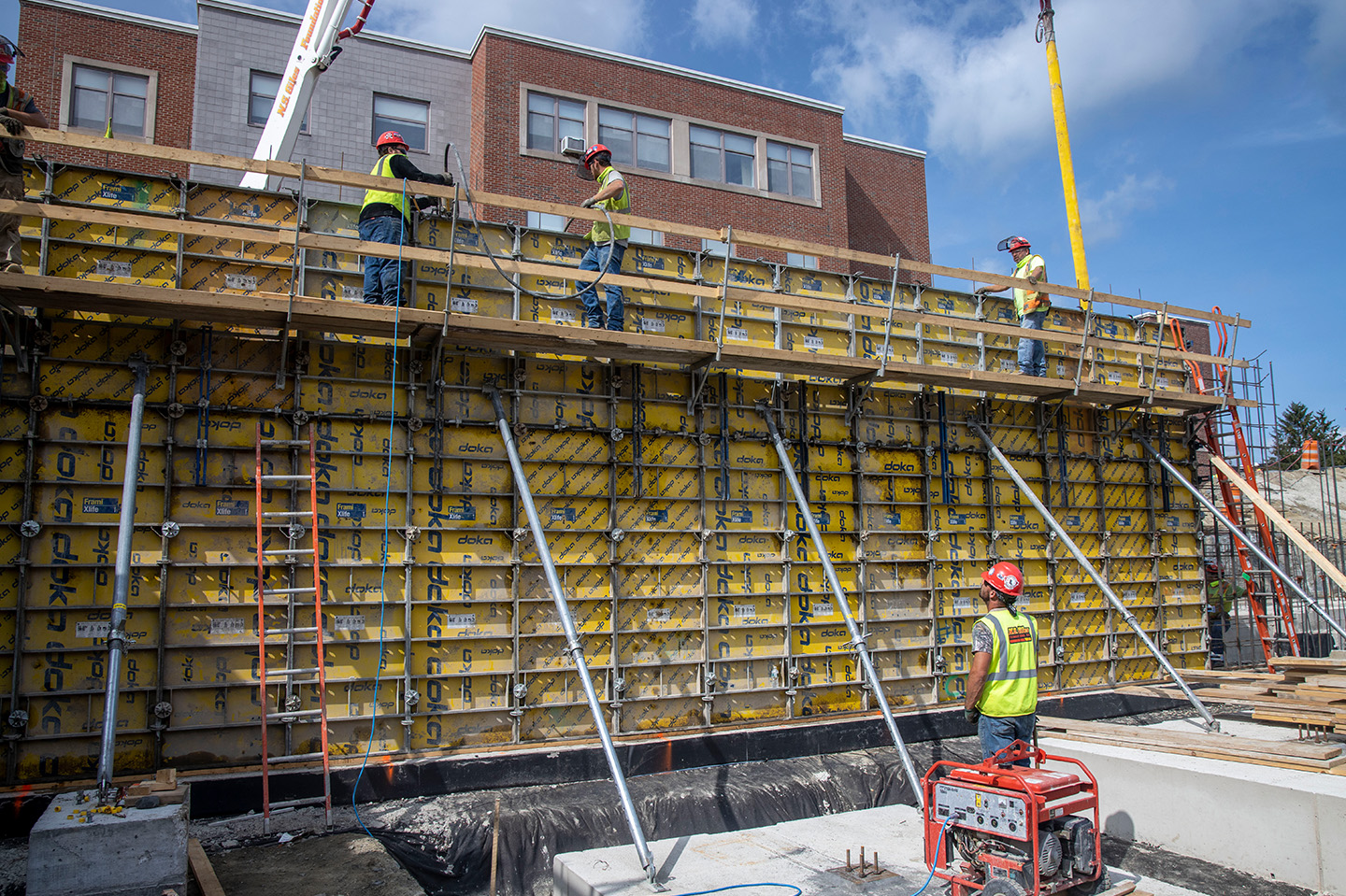 Construction Engineering Technology students working on a construction site