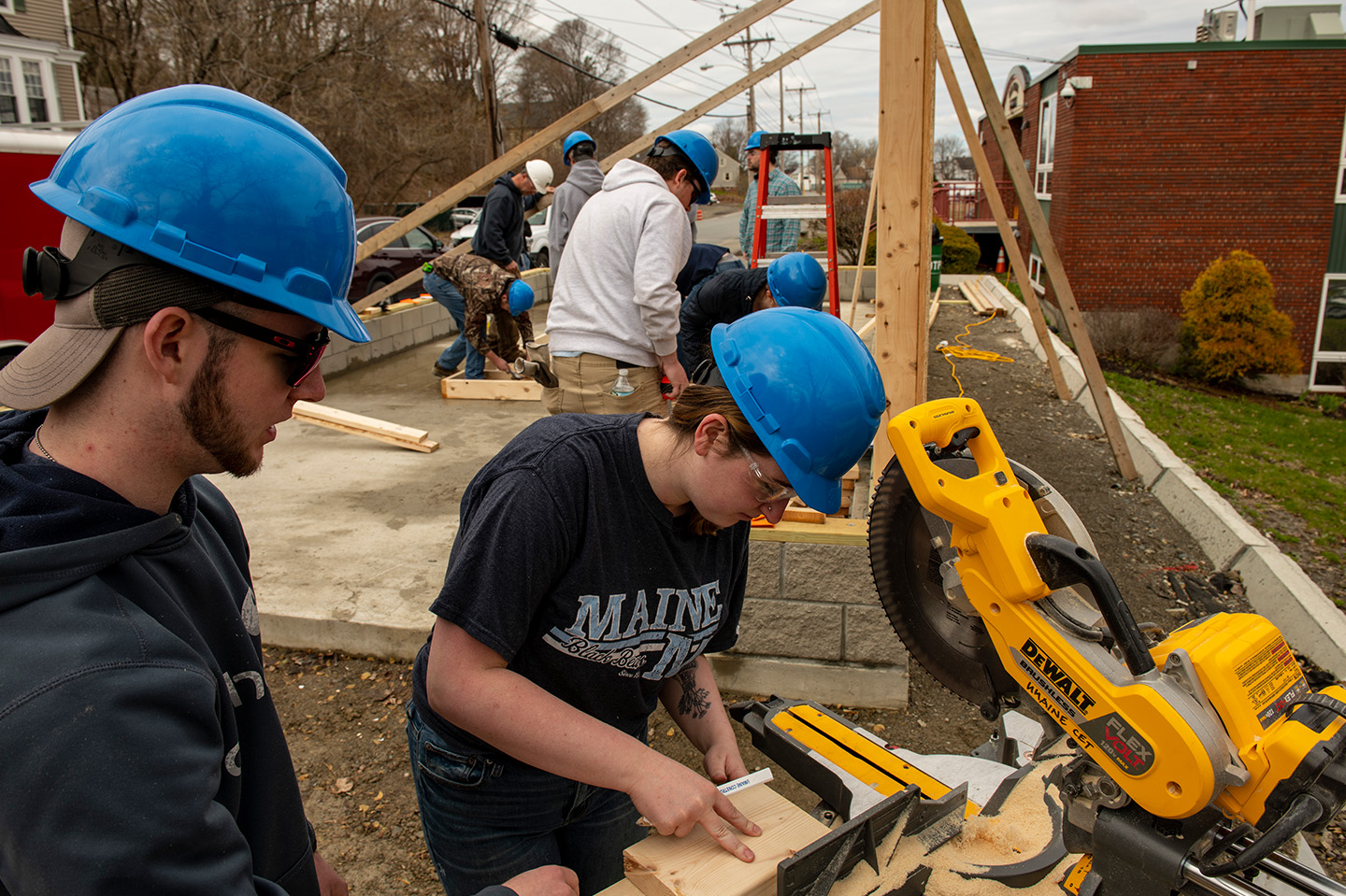 Construction Engineering Technology students working on a construction site