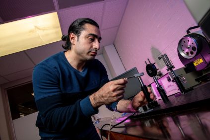 Mechanical Engineer in a lab working with heat transfer systems