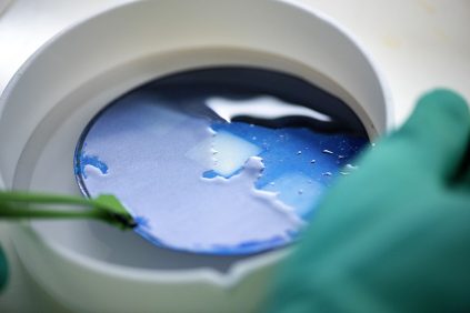 An engineering working in a hydrophobic and surface technologies lab