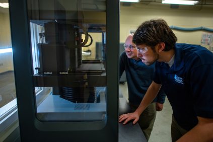 Engineers working with digital and additive manufacturing