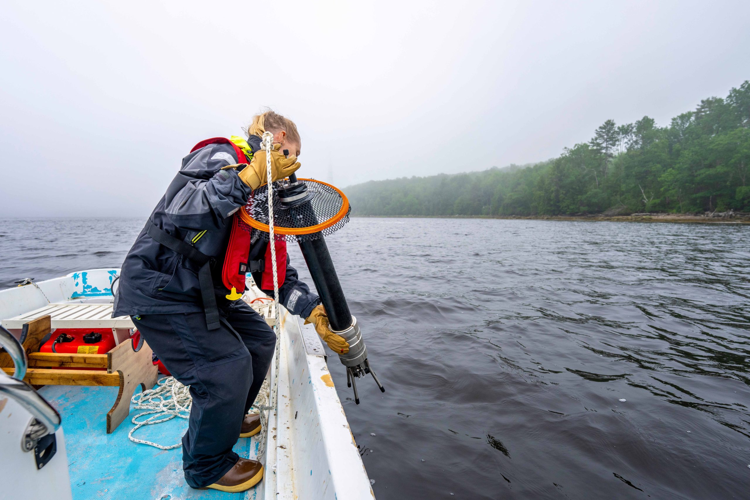 Civil and Environmental Engineering research team getting water samples