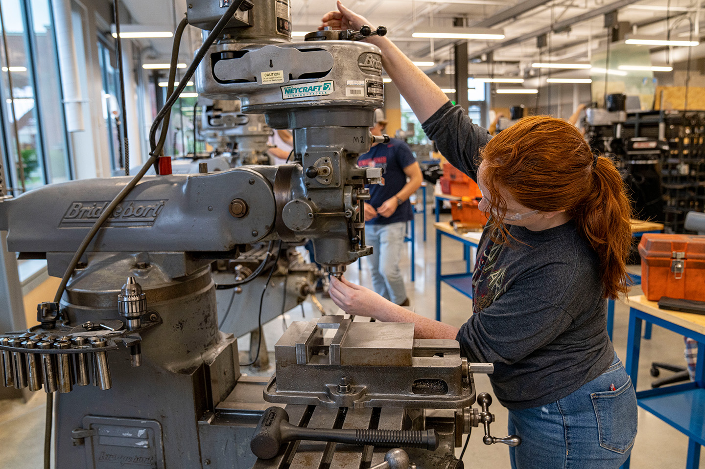 Mechanical Engineering Technology student working at the Pratt & Whitney Machine Tool Lab