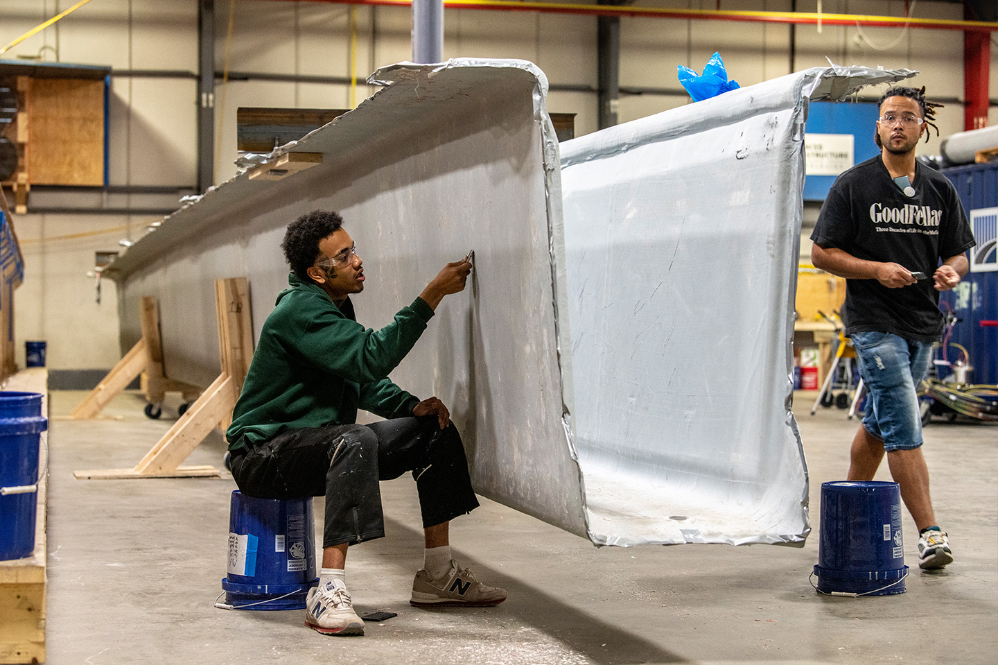 Engineers working on the AIT Girder fabrication