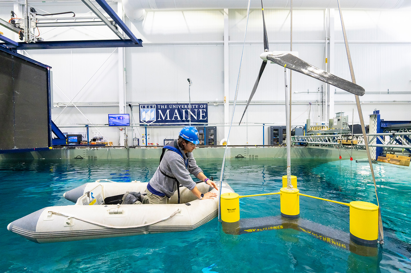 Students in the ASCC Engineering program demonstrate a model floating wind turbine in the Wind/Wave lab