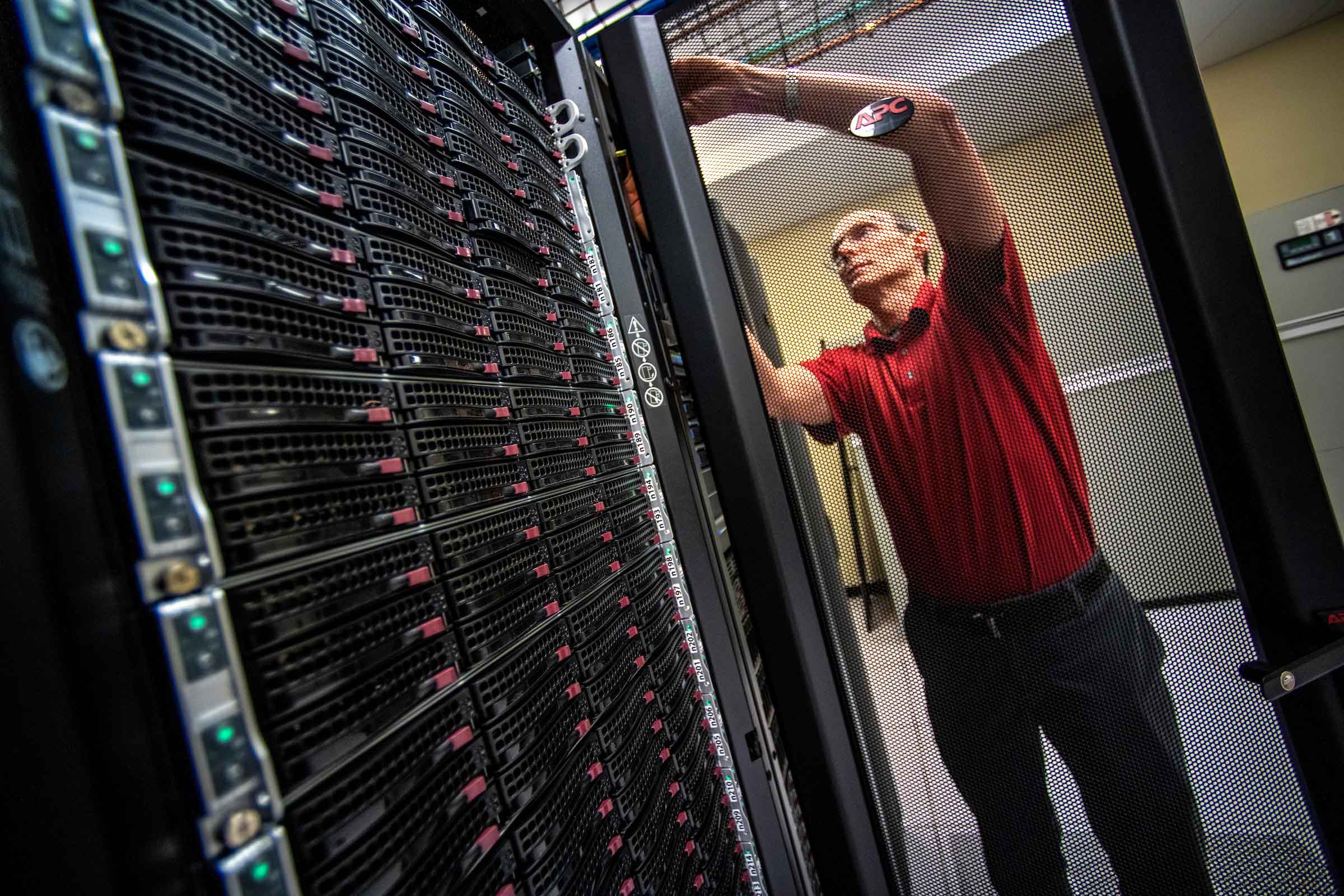 Professor working on a supercomputer