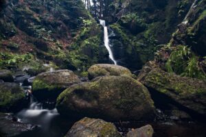 photo of waterfall over rocks