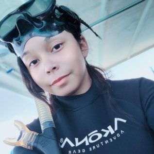 girl wearing snorkeling gear