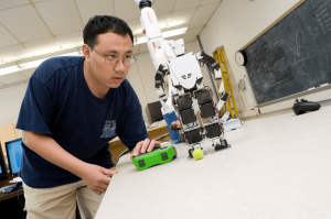 student working in robotics lab