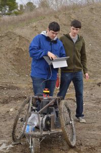 two students testing capstone project