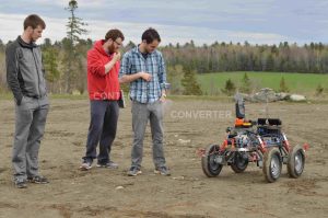 three students testing capstone project