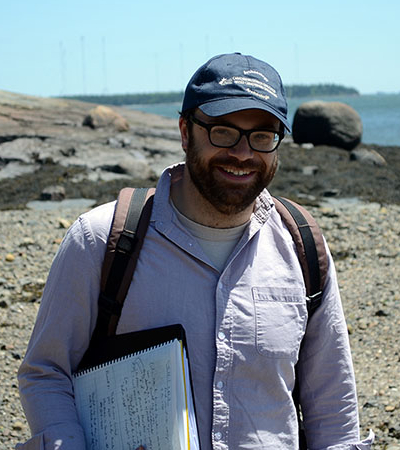 A photo of volunteer archaeologist, Gabe Hrynick