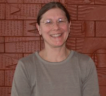 A professional portrait of Alice Kelley