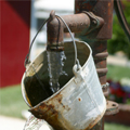 water spigot and bucket