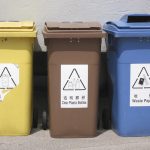 Three recycling bins