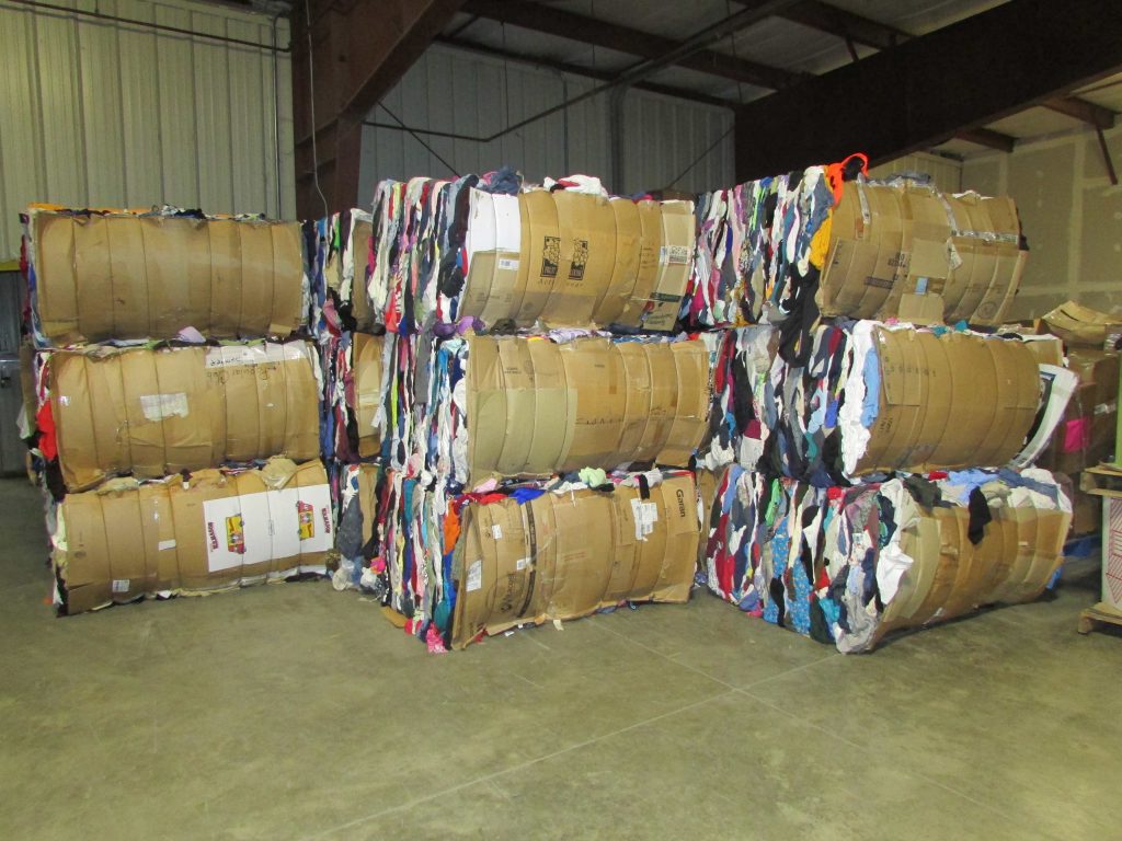 Image of stacked baled clothing