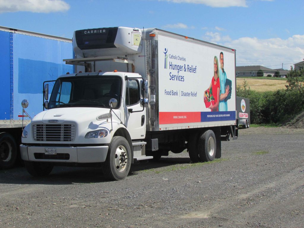 Truck with text that reads "Hunger and Relief Services"