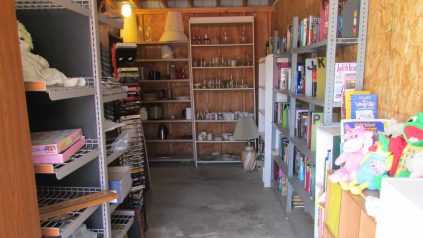 Image of swap shop interior with shelves full of items