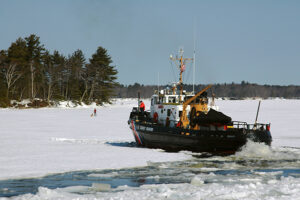 Ice Cutter on frozen Kennebec River