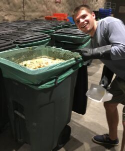 Student Skyler Horton collects food waste samples for research