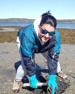 Gabby Hillyer digging for clams