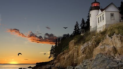 Lighthouse on the Maine coast at sunset