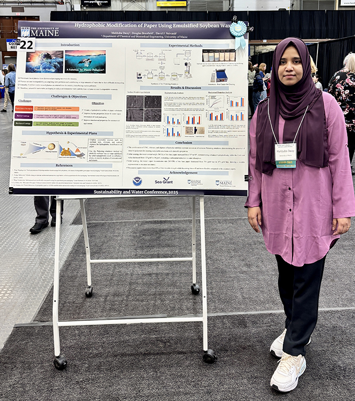 Mahbuba Daisy with her graduate poster which received an honorable mention