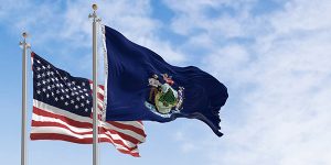 US and Maine flags