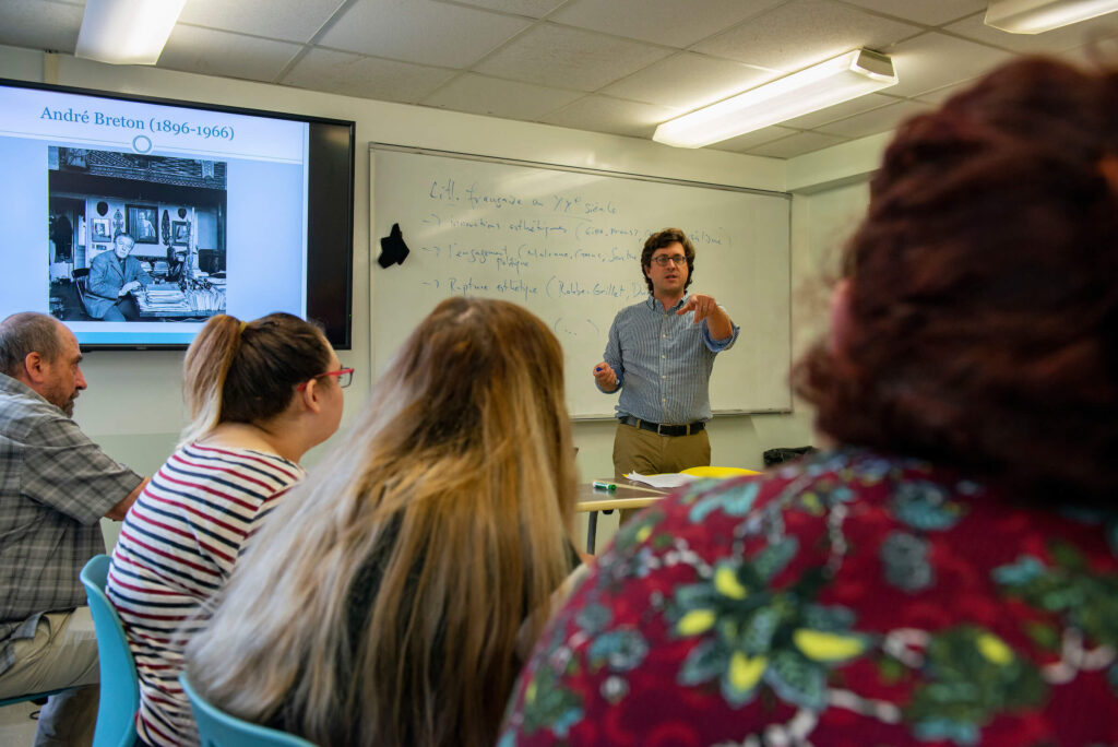 professor leading classroom discussion