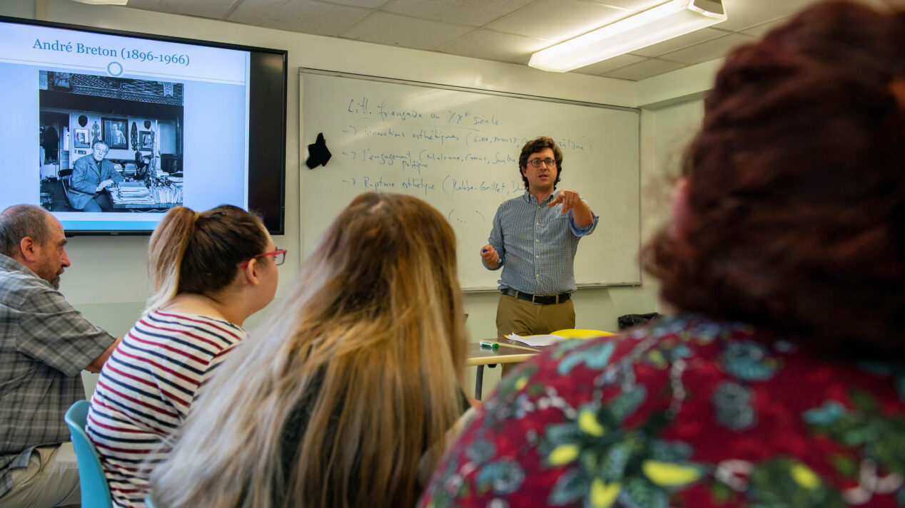 professor leading classroom discussion