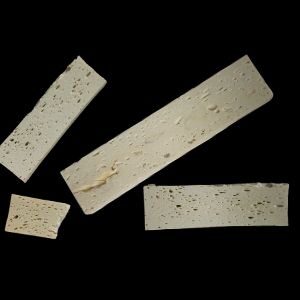 blocks of bone-like foam made from nanocellulose on black background