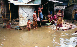 Floodwaters surrounding houses in Dhaka, Bangladesh