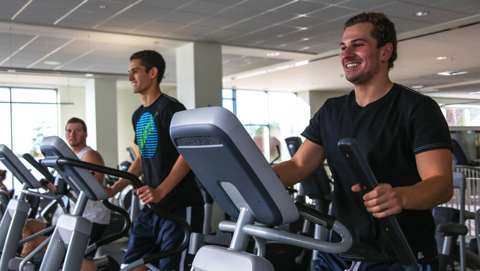 Men working out in the New Balance Recreation Center