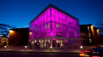 Exterior of the Collins Center for the Arts at night