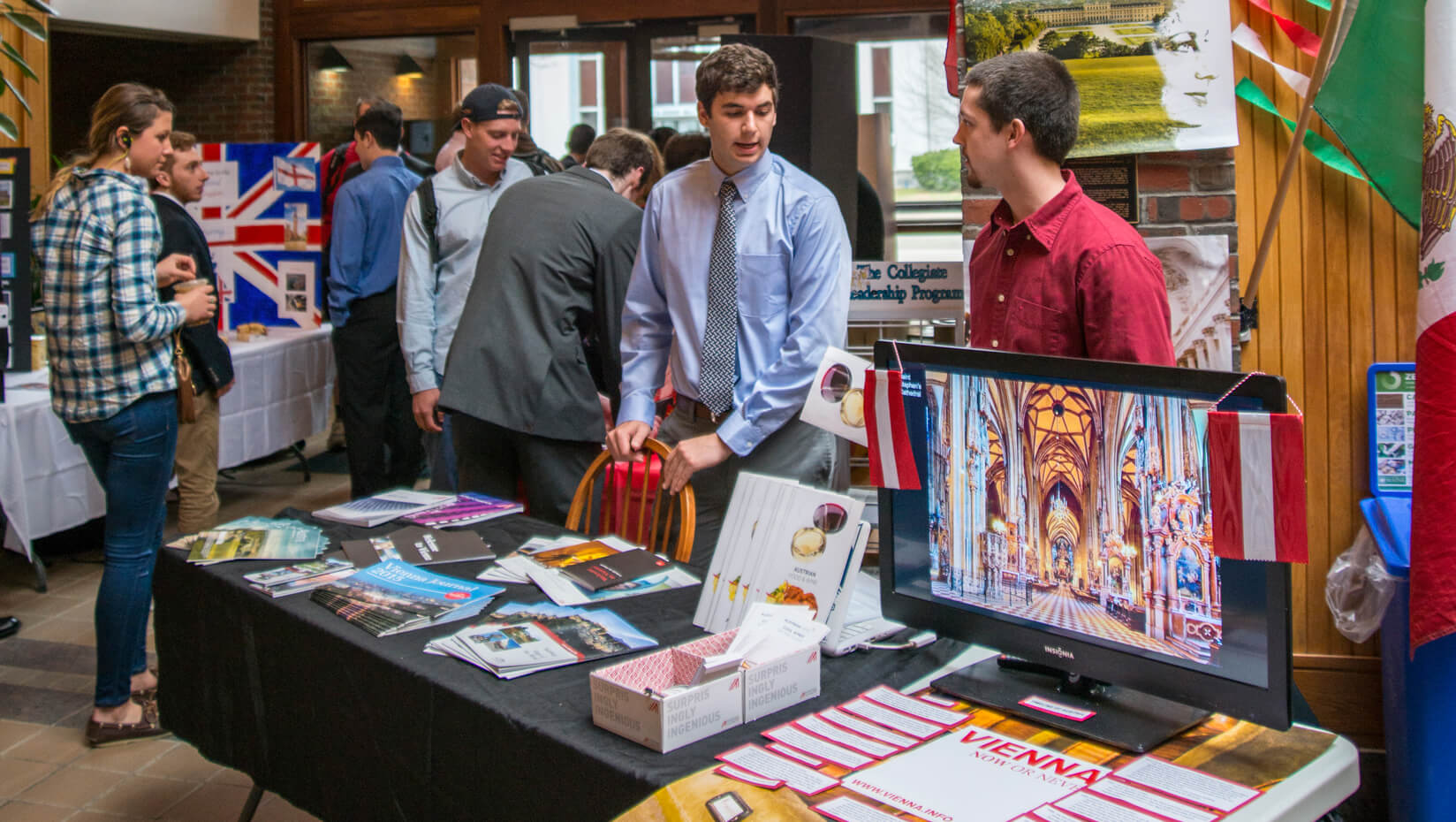 Business School students standing with their displays at the 2016 International Trade Show