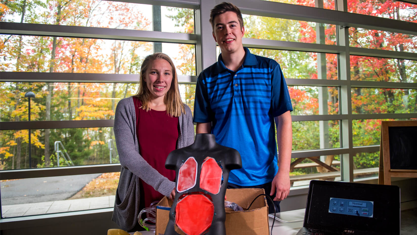 Students with a breathing simulator