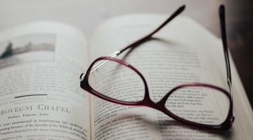 Glasses resting on a book