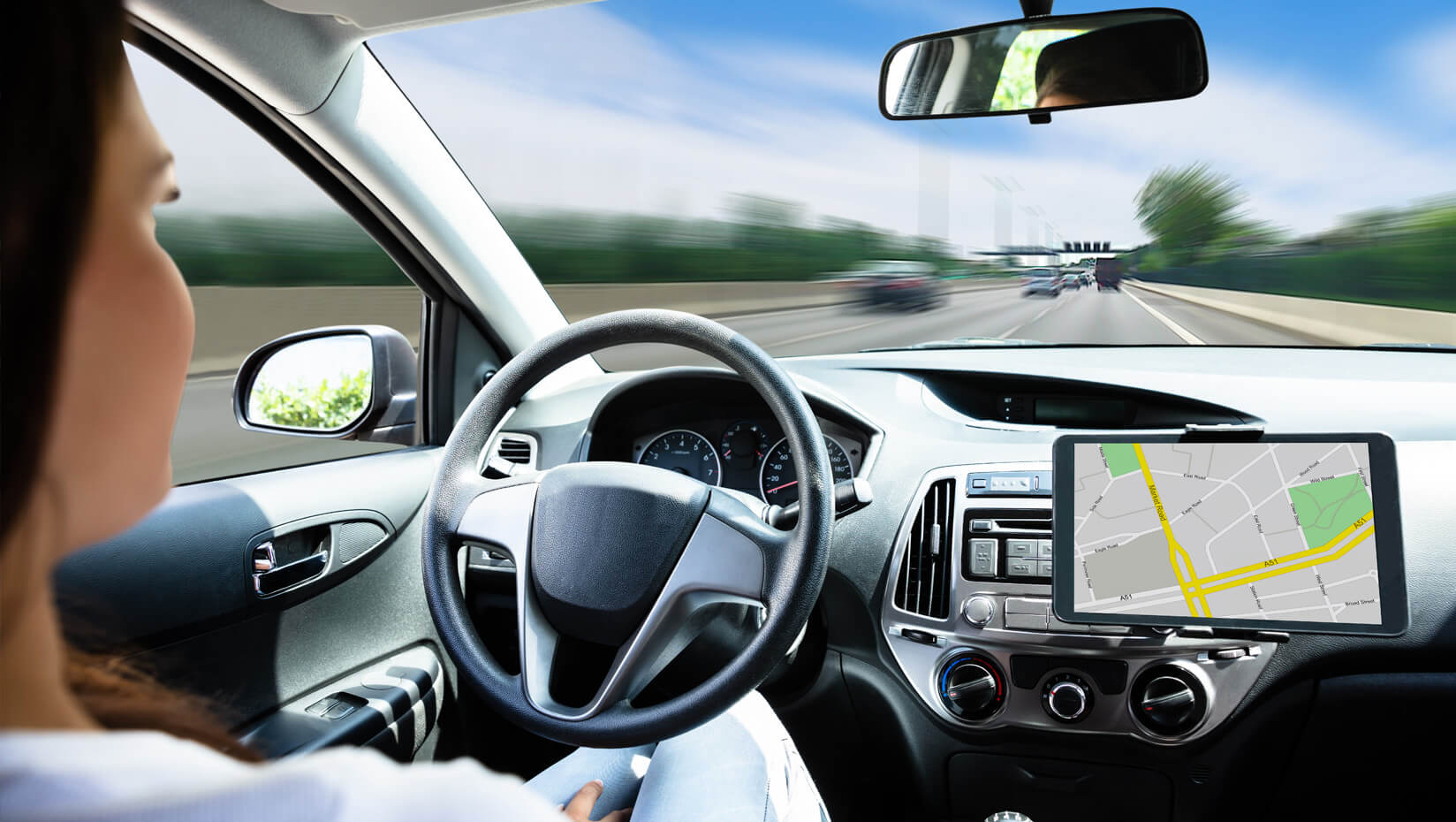 Woman in a self-driving car