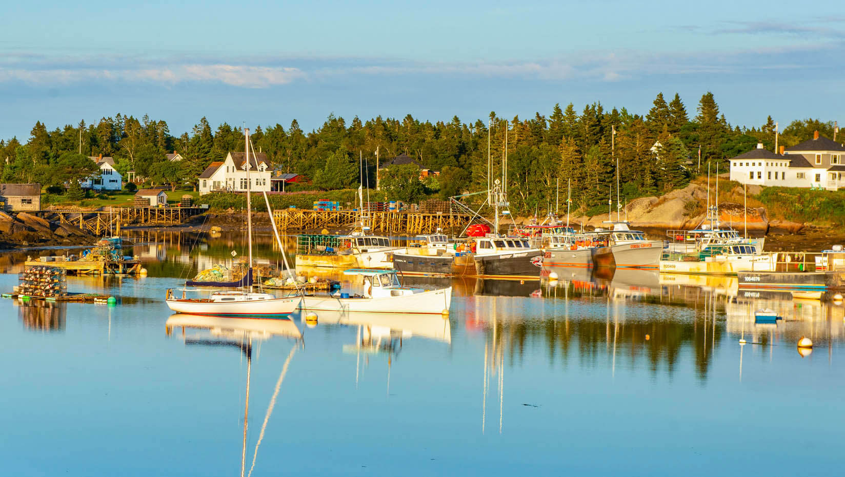 Image of lobster boats at a working waterfront in Maine