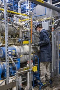 Jamie Harsgreaves, SynCOPP manager working on the paddle dryer