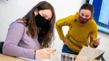 Students learning in a math class, wearing face masks
