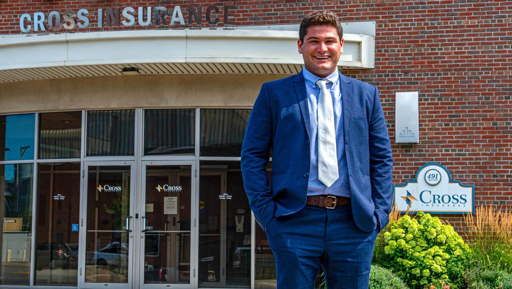 Portrait of Cameron Houde in front of Cross Insurance Center