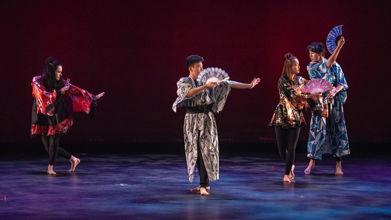 A photo of dancers performing on stage