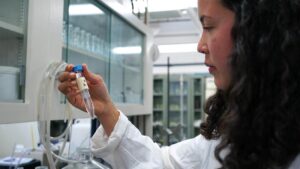 A photo of a student researcher in a lab