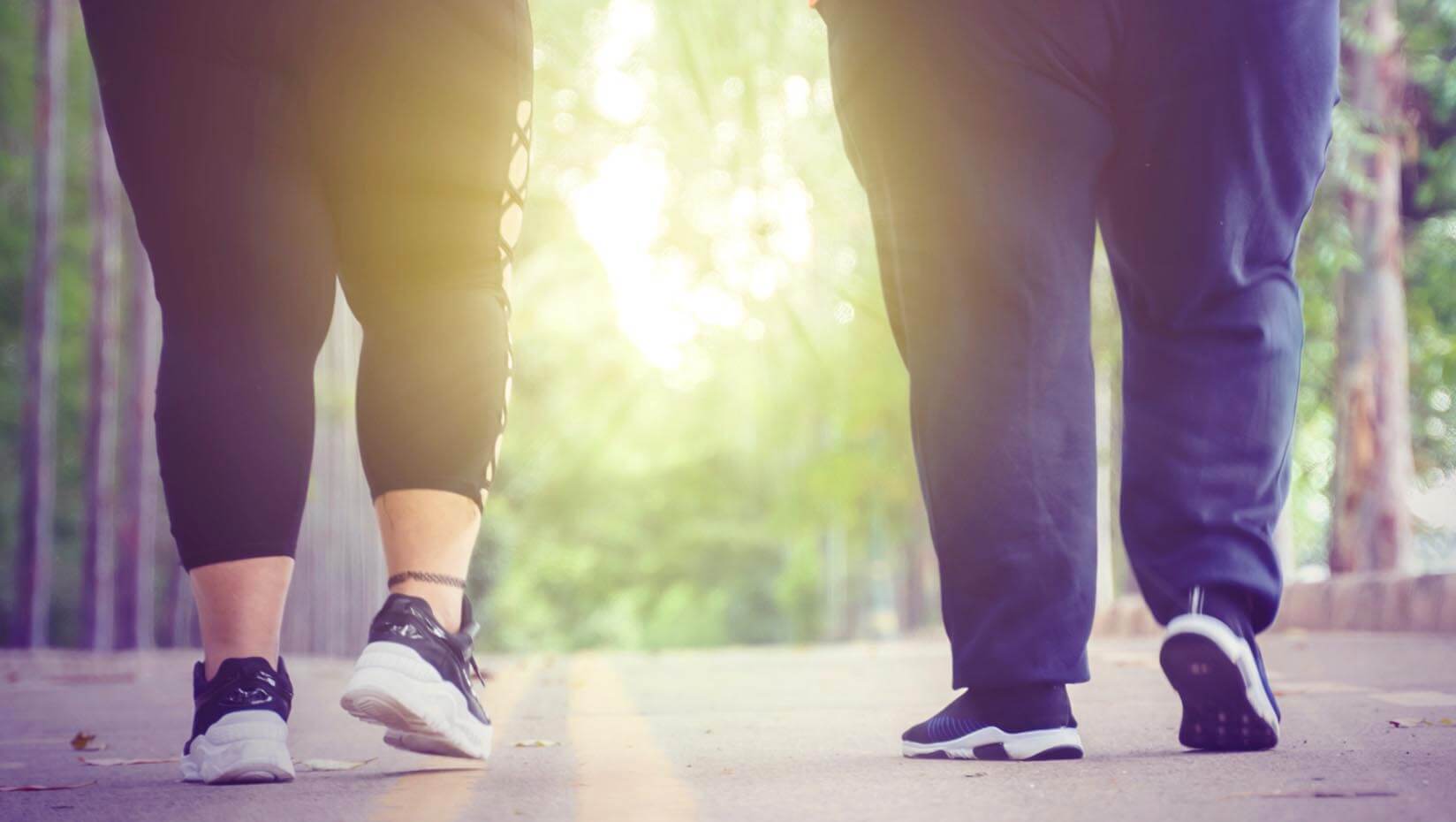 A photo of two pairs of legs walking