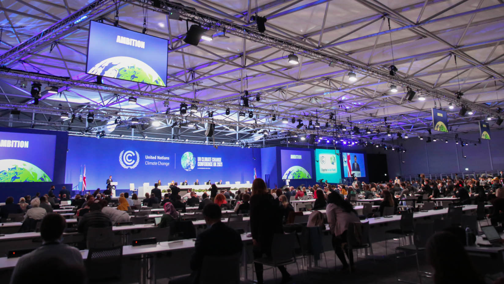 Photo of a crowd attending the United Nations Framework Convention on Climate Change (UNFCCC) 26th Conference of the Parties (COP26) in November 2021 in Glasgow, Scotland.